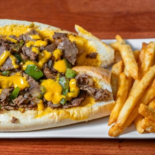 Philly Cheese Steak, Crispy fries.