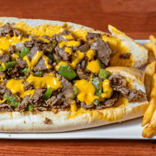 Philly Cheese Steak, Crispy fries.